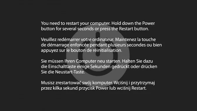 Schermata di kernel panic multilingue: il Mac chiede di riavviare tenendo premuto il tasto di accensione